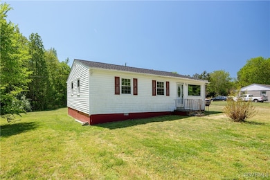 View of front of home with crawl space and a front