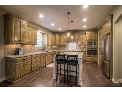 Beautiful kitchen is perfectly laid out with tons 