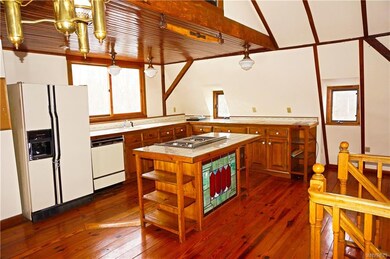Beautiful eat in kitchen with reclaimed wood ceili