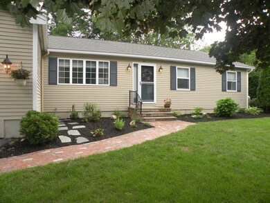 2 Brick walkway and gardens at front ent