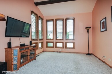 Two-Story Family Room w/fireplace, and abundant wi