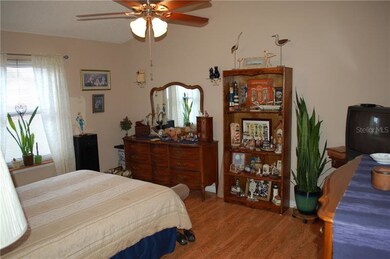 Master bedroom with laminate flooring