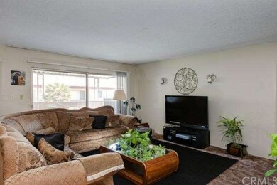 Living room view of other unit