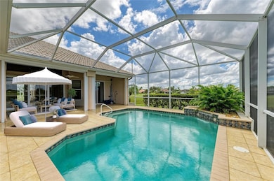 Virtually Staged; All tile screened lanai and heated pool area with (25x13) under truss.