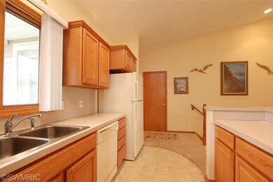 1679 Lisa Dr SW unit 26, Byron Center, MI 49315 - photo 4