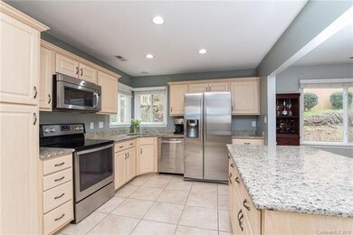 Granite Counters, New Light Fixtures, Tile Floorin