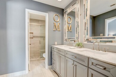 Another view of gorgeous primary bathroom with lot