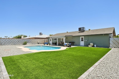 Spacious backyard w/turf