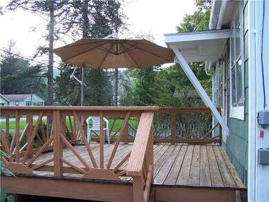 Exterior Front Newly painted front deck for entert