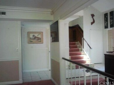 FRONT ENTRY TO LIVING ROOM & FORMAL DINNING ROOM