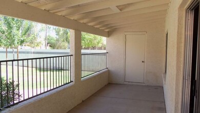 Covered Patio overlooks greenbelt
