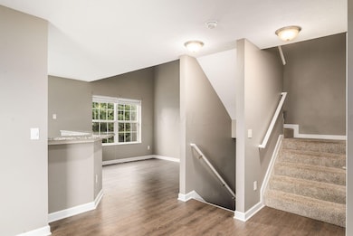 View of Kitchen and Stairs Entrance