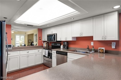 Kitchen with appliances with stainless steel finis