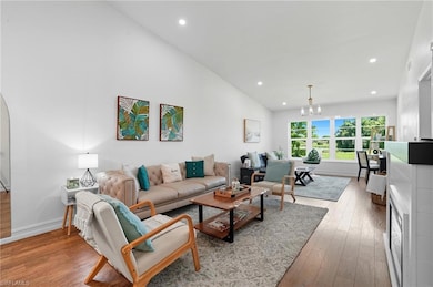 Beautifully updated open floor plan with abundant natural light, modern finishes, and seamless flow from living to dining areas.