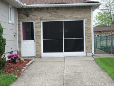 Exterior Front GARAGE TURNS INTO SUMMER ROOM!