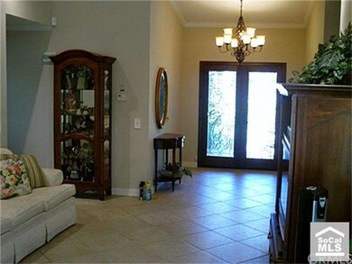 Formal entrance with one of a kind custom doors