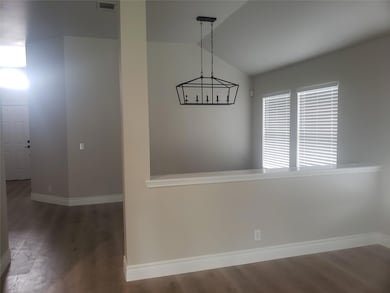 Unfurnished dining area with wood finished floors