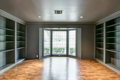 The freshly painted STUDY  has  new hardwoods, flo