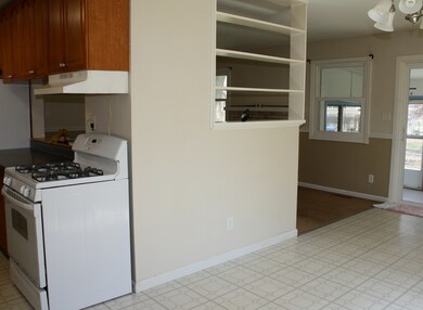  View of eating area, kitchen and into family room