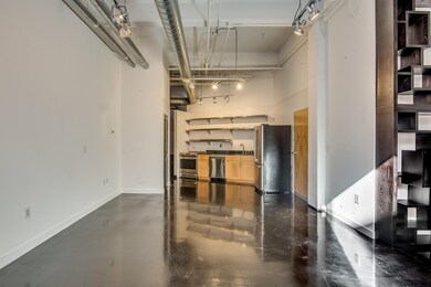 Open concept living, dining and kitchen. 