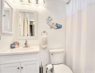 Remodeled Master Bath 1 with updated vanity and li