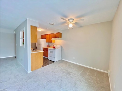 View from slider to kitchen, dining, living room.