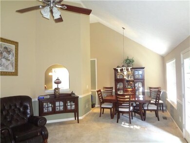 Combo dining area with access to back door that goes out to the back yard onto your wood deck.