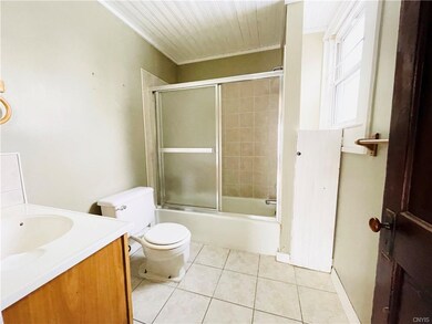 First floor full bathroom is located off the dinin