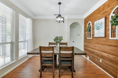 As you enter to your left is a formal dining room