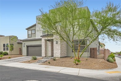 Front view featuring an attached garage, stucco si