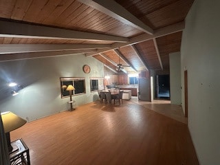 Open beam great room flowing to Kitchen