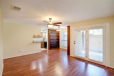 Unfurnished living room with baseboards, visible v