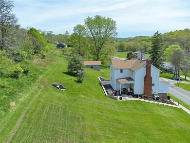 Side view of house and side yard area.