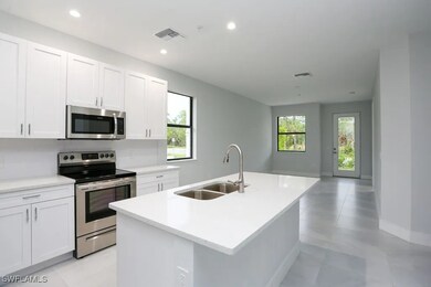 Kitchen featuring sink, appliances with stainless