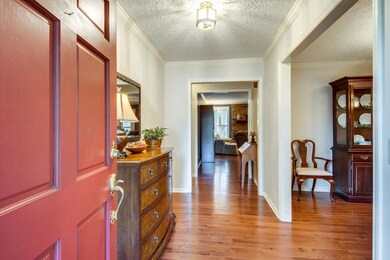Come on in. Your view when you enter with hard wood floors throughout. 