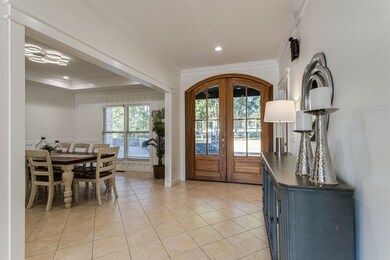 Tile flooring throughout the first floor with open concept entertaining
