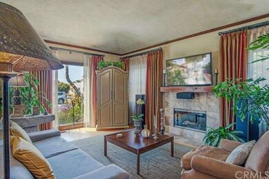 Living room with coved foe painted ceiling, FP and