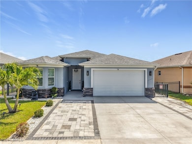 View of front facade featuring stucco siding, conc
