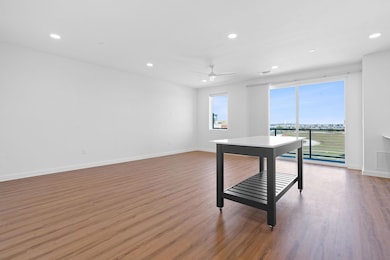 Unfurnished office featuring recessed lighting, light wood-type flooring, and a ceiling fan