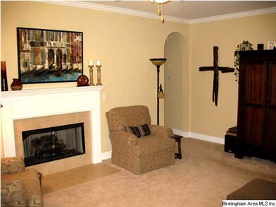 Pretty crown mouldings enhance the beauty of the L