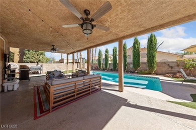 View of pool featuring a fenced backyard, a patio, ceiling fan, and outdoor lounge area