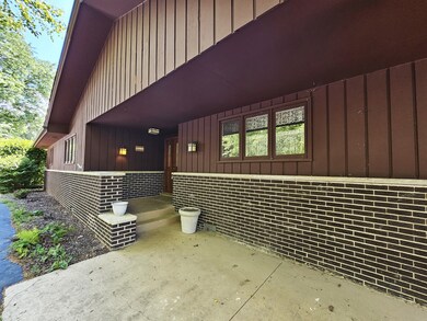 Cover front porch entry. Exterior painted 2023