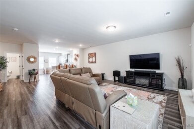 Living room featuring dark wood-type flooring and