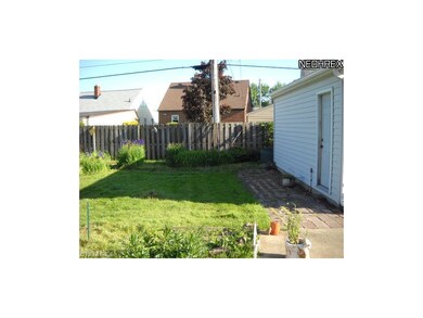 Back yard with plenty of room to set up the corn h