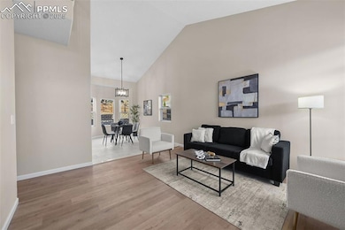 Living room open to formal dining room