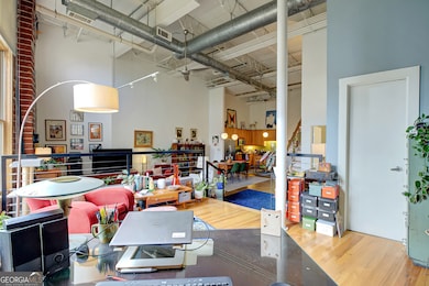 View from bedroom to walk-in closet/living room/di