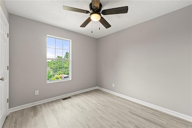 Spare room with light hardwood / wood-style floors
