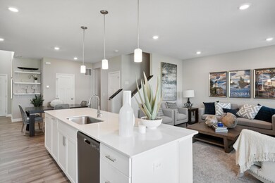 Tons of natural light in this open concept floorplan! *Photos of model home; colors and finishes will vary.