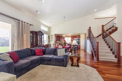 the french doors and large windows fill the room w