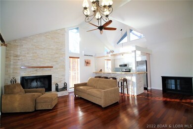 Great room w/cozy wood burning fireplace and warm